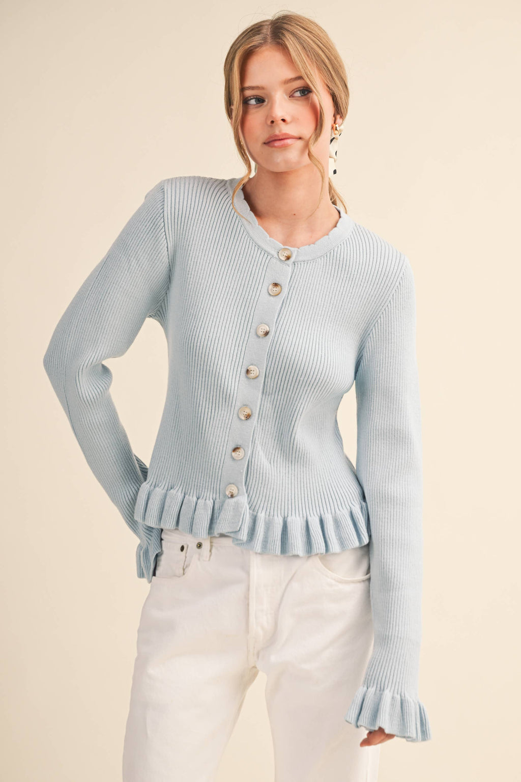 RUFFLE HEM RIBBED KNIT SWEATER