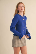 RUFFLE HEM RIBBED KNIT SWEATER