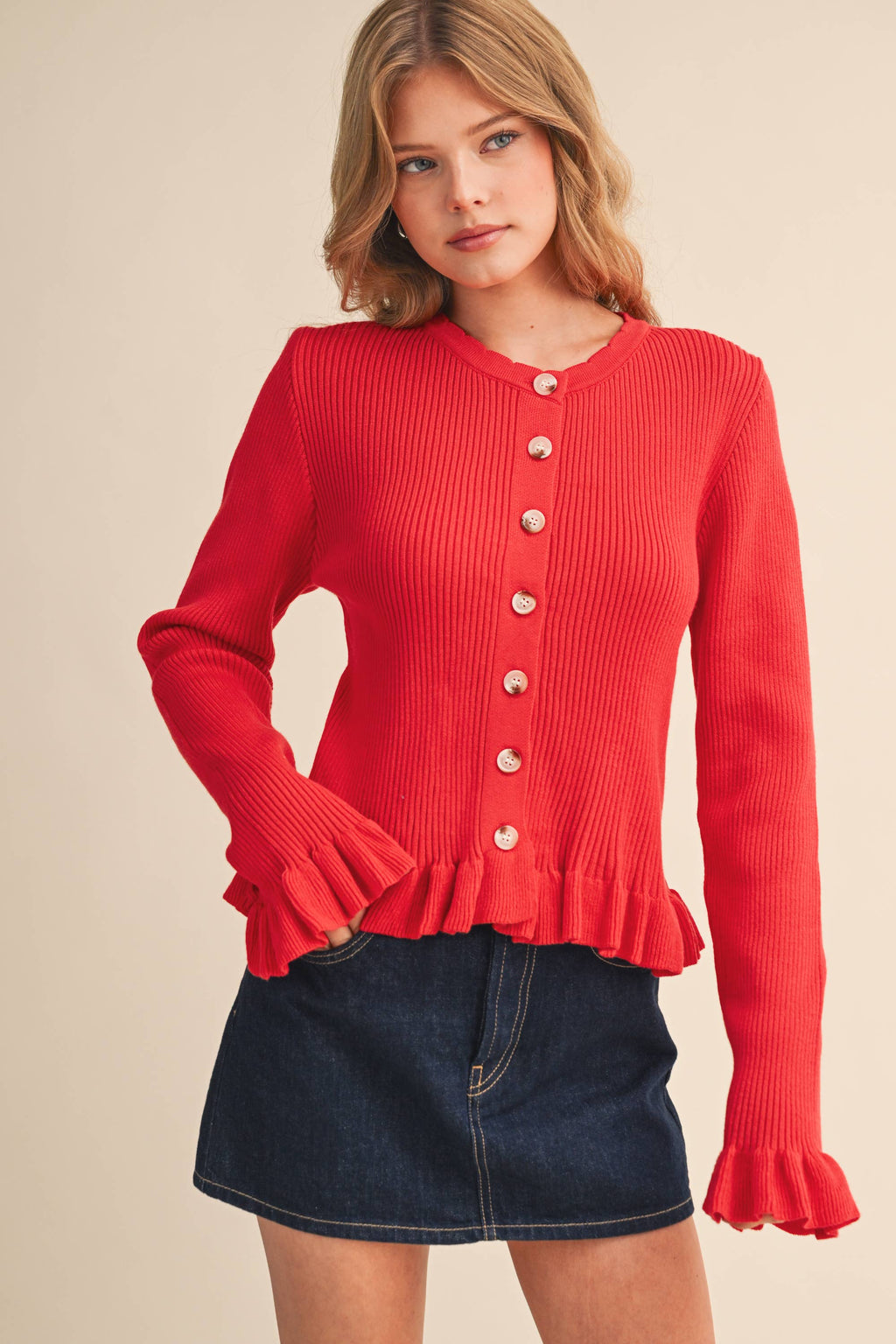 RUFFLE HEM RIBBED KNIT SWEATER