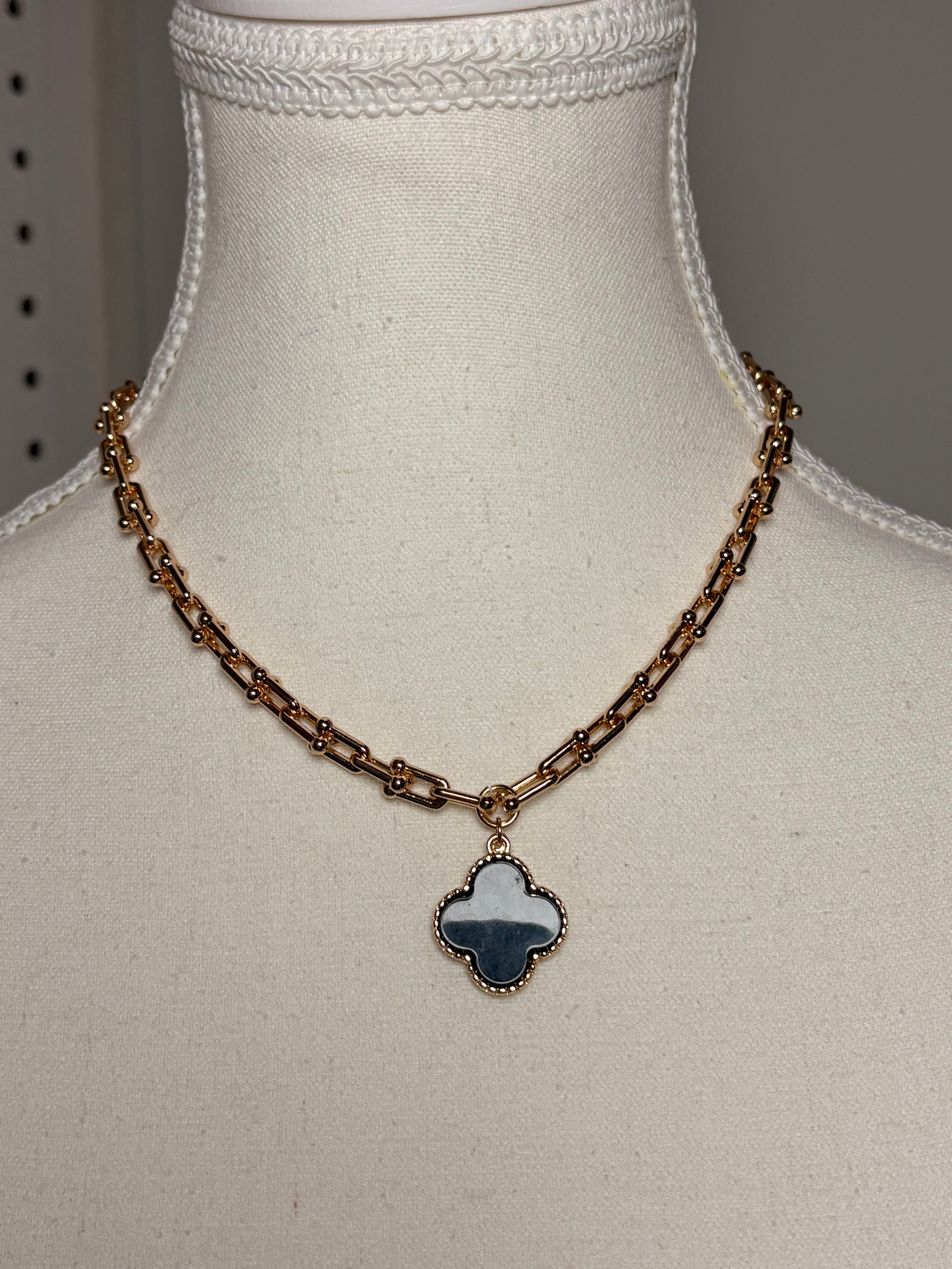 Gold and Black Clover Necklace