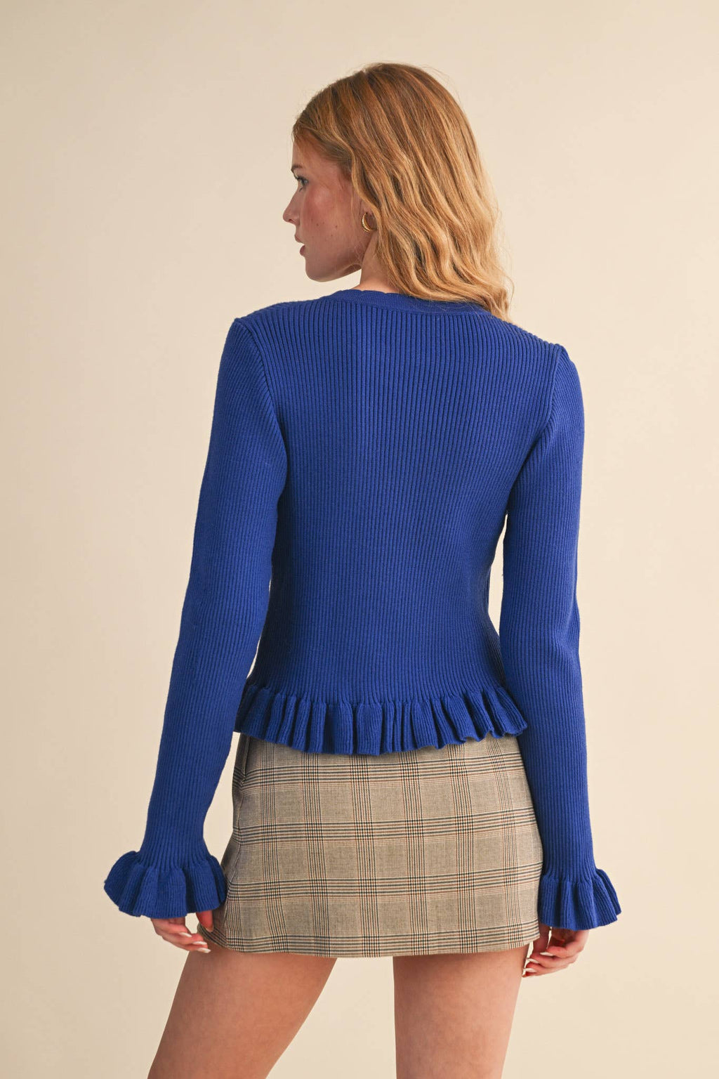 RUFFLE HEM RIBBED KNIT SWEATER