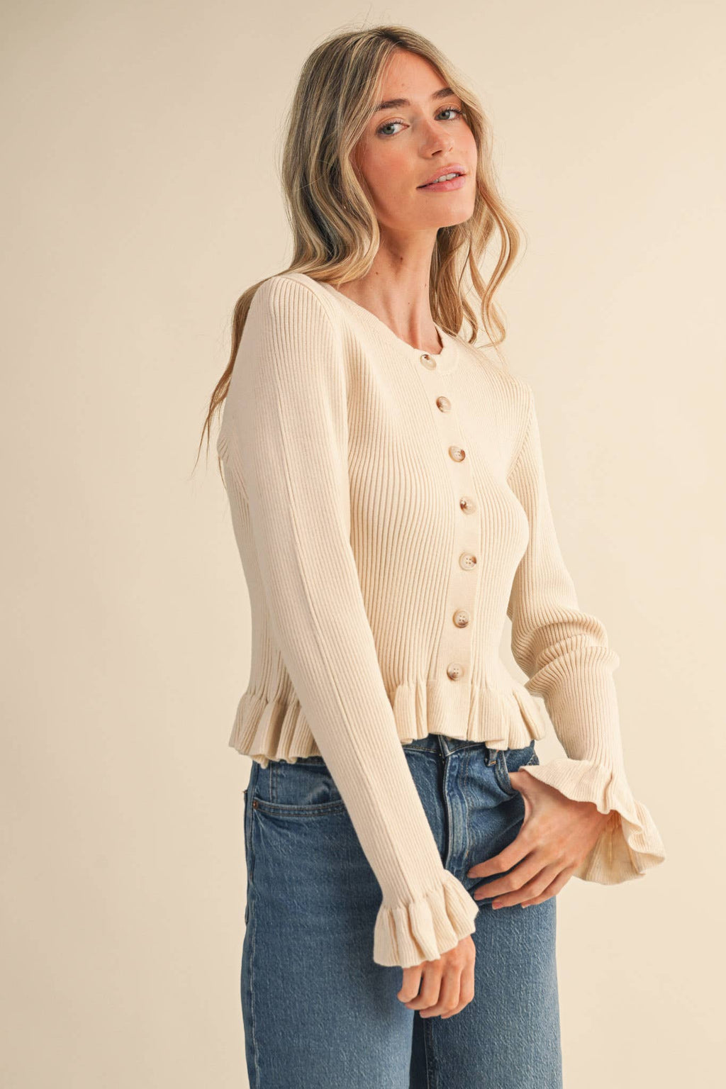 RUFFLE HEM RIBBED KNIT SWEATER