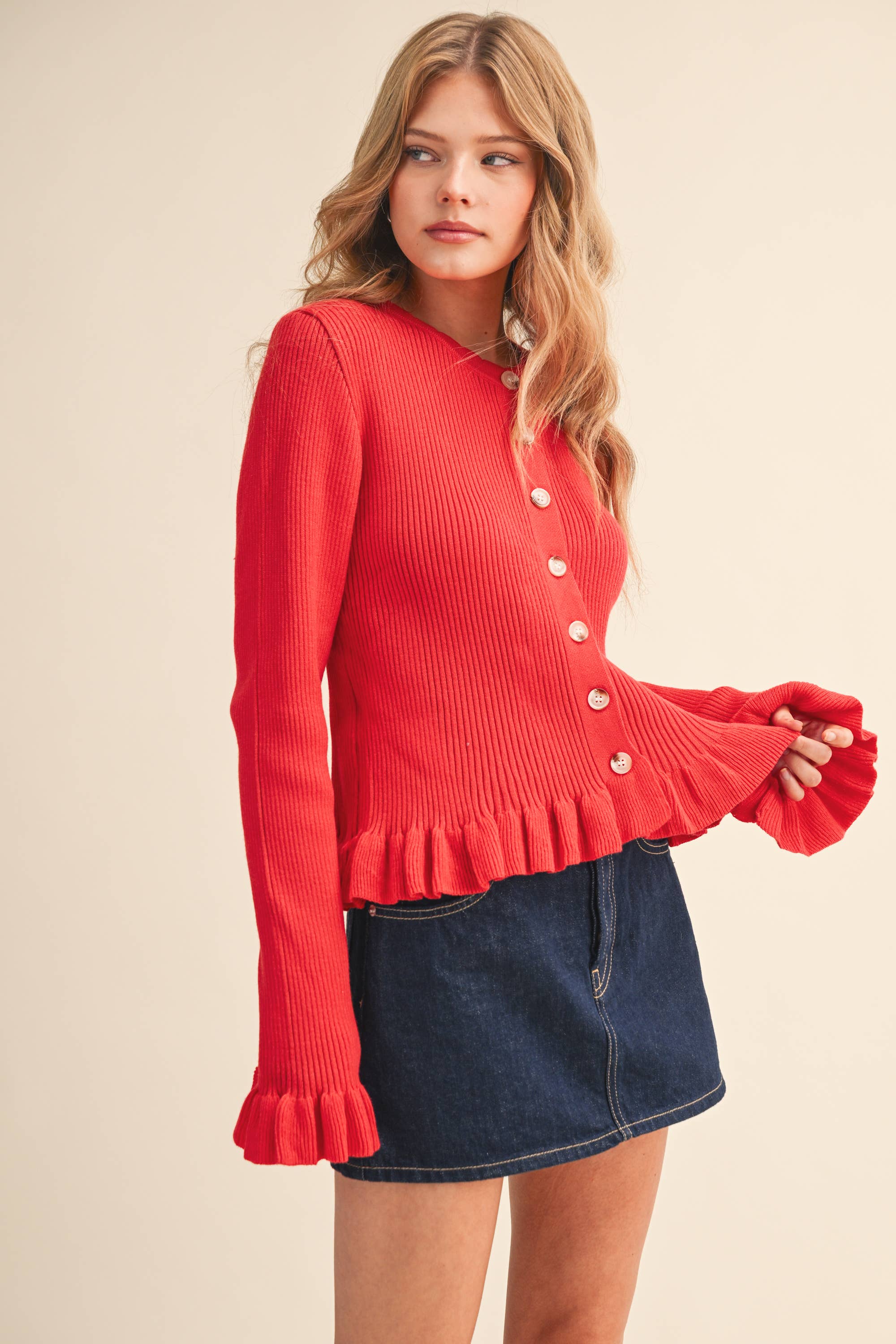 RUFFLE HEM RIBBED KNIT SWEATER
